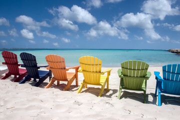 Colorful beach chairs on Aruba coast