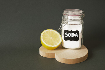 soda in a labeled jar and lemon on a heart-shaped wooden stand
