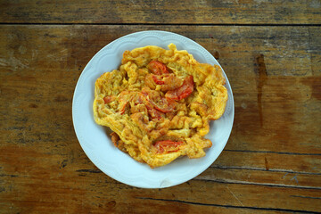 Thai food, omelette with tomato