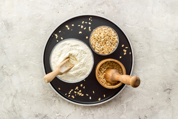 Oat flour in bowl - gluten free flour for baking