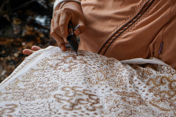The technique of making batik by writing using a canting tool. Canting consists of nyamplung,...