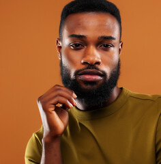 young pretty african american man posing cheerful on brown background, lifestyle people concept