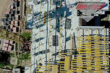 Aerial view of high residential apartment building under construction. Real estate development