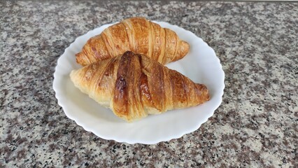 Photo of Croissant on white dish