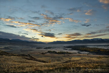 Russia. South Of Western Siberia, Mountain Altai. Autumn dawn in the North-Chuyskiy mountain range in the heart of the Kurai steppe.