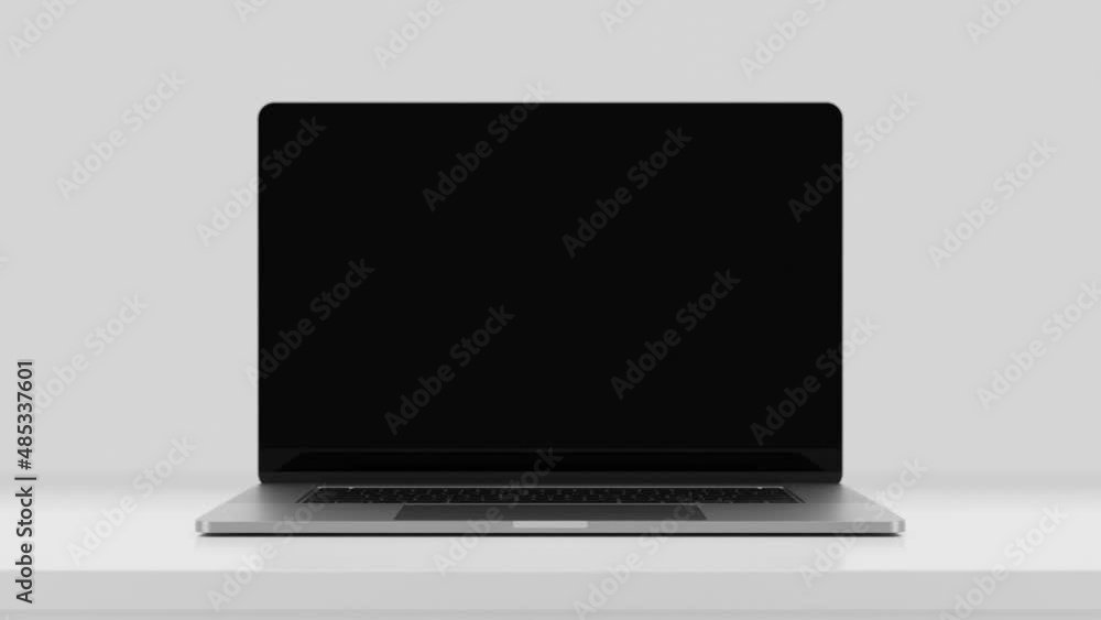 Poster laptop frameless screen - the computer on the table opens to the camera coming out from the bottom. 