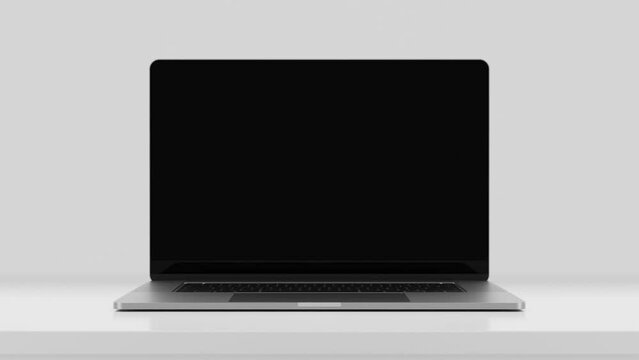 Laptop frameless screen - The computer on the table opens to the camera coming out from the bottom. Includes a green screen and a luma matte mask. Easy way to replace the background. 4k 60fps UHD.