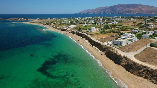 Aerial drone video of paradise sandy emerald beach of Girismata, Aegean sea, Skyros island, Sporades, Greece