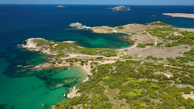 Aerial drone video of famous bay and sandy beach of Agios Petros in Northern Skyros island, Sporades, Greece