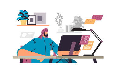 arab businessman freelancer sitting at workplace arabic business man looking in computer monitor working process