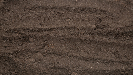 Black land for plant background. Top view.