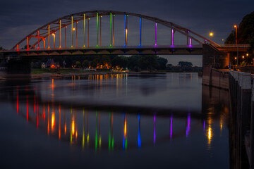 Bridge in Deventer lit with the colors for the LGBT community