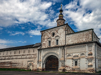 Holy Gate, monastery wall and St. Nicolas church above the gate, XVII - XVIII centuries.  Asumption...