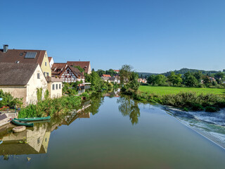 Fototapeta na wymiar Green Summer Landscape along the Donau Ries Harburg City Valley with blue sky background