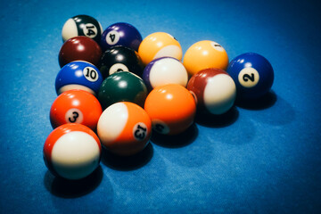 Pool game - balls in triangular shape on a table