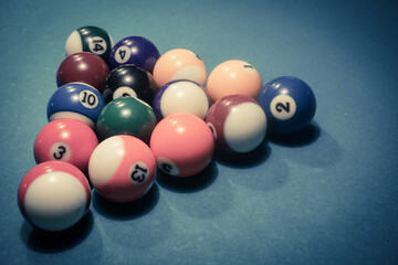 Pool game - balls in triangular shape on a table