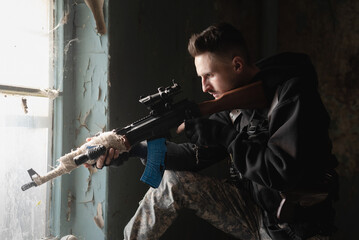 Mercenary soldier with a rifle concept.