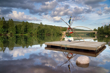 Floating raft on the Klaralven river near Branas
