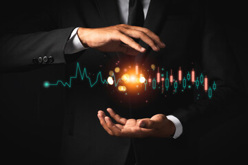 Businessman analyze sales data and graph economic growth. Planning and business strategy Analysis of forex trading Finance and banking.