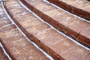 Sand sprinkled on outdoor stairs to prevent slipping on slick steps. Sand improve traction on snowy...