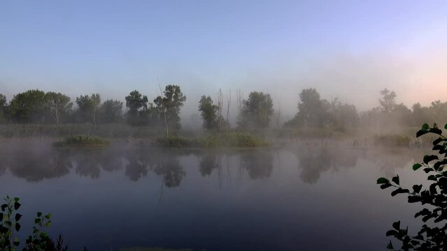 Fog moves on the surface of the water in the river. River Psel. Ukraine.