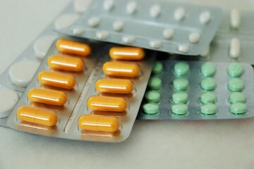 Different medicines: tablets, pills in blister pack, medications drugs, macro, selective focus....