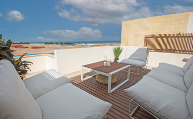 Roof terrace patio with chairs in tropical luxury holiday villa