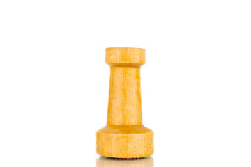 One old wooden chess piece in white, macro, isolated on a white background.