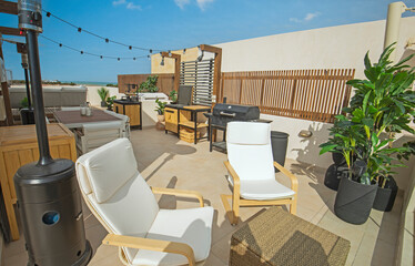 Roof terrace patio with chairs in tropical luxury holiday villa