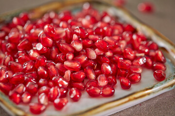 pomegranate seeds on a plate