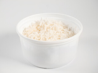 Simple prepared basmati rice in white plastic food box