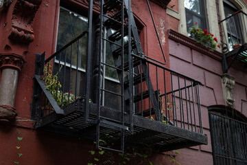 Fire Escape on an Old Colorful Residential Building in New York City