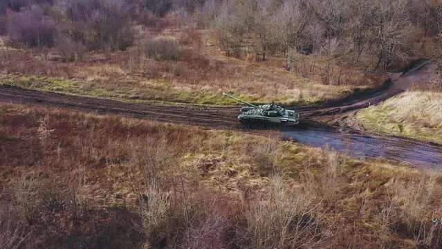 View from Above.The Main Tank is Moving Across the Field.