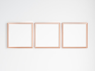 three square gold frames on the wall, minimalist mockup, 3d render