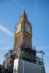 Historic and Iconic restored Big Ben after conservation works in 2022 with blue and gold color scheme - obrazy, fototapety, plakaty