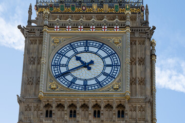 Fototapeta na wymiar Historic and Iconic restored Big Ben after conservation works in 2022 with blue and gold color scheme