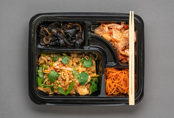 A set of Korean food in a container. Korean cuisine. Asian Lunches