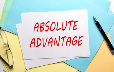 ABSOLUTE ADVANTAGE text on paper on the colorful paper background