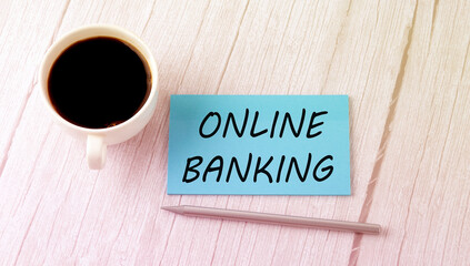 ONLINE BANKING text on the blue sticker with cofee and pen