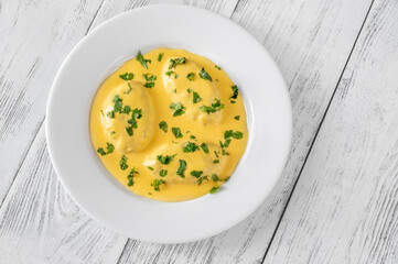 Quenelle with Hollandaise sauce