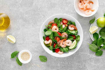 Shrimps spinach tomato fresh salad, low carb ketogenic, keto diet. Healthy food. Top view