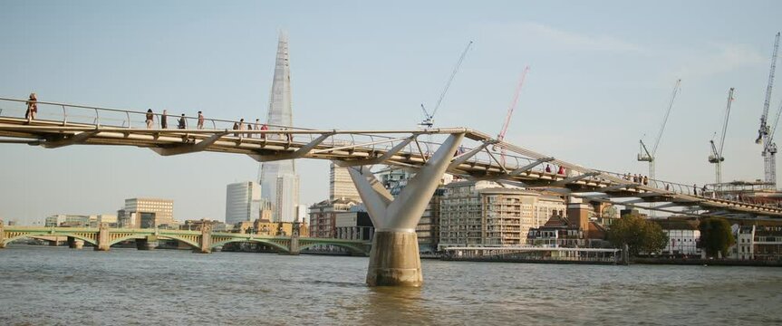 Diverse Couple Enjoying The View On Millenium Bridge Thames River Slow Motion London