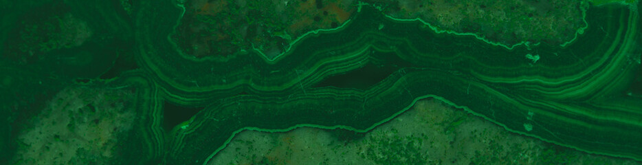 Malachite. Green mineral background. long banner