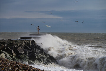 Hastings Harbour Arm being Battered.