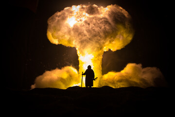 Nuclear war concept. Explosion of nuclear bomb. Creative artwork decoration in dark.
