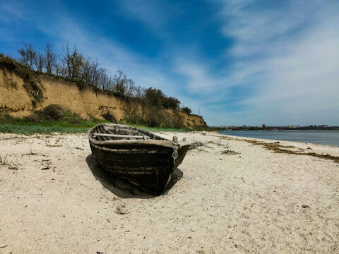 Fishing boat on the beach of Taganrog Bay. Rostov region. Russia.