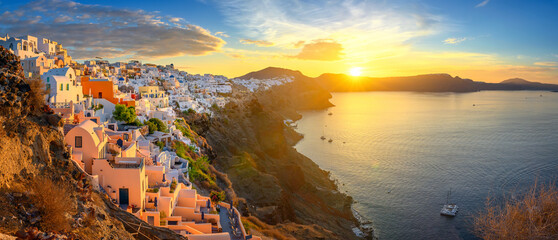 Picturesque sunset on famous view resort over Oia town on Santorini island, Greece, Europe. luxury...