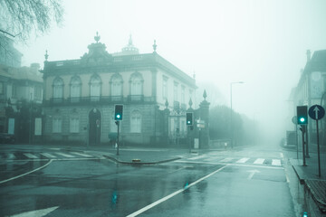 The historic center in a heavy fog in the early morning. Porto, Portugal. - obrazy, fototapety, plakaty