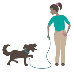A girl walks a dog on a leash