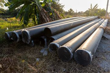 Polyvinyl chloride Drainage Pipe on a Construction Site. Polyvinyl chloride drainage pipes stacked...